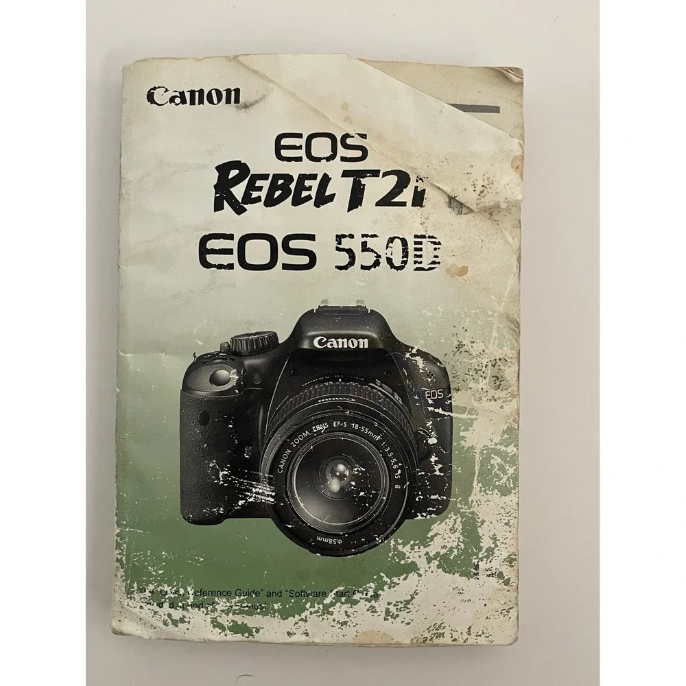Canon EOS Rebel T2i 550D OEM Accessories LC-E8E Charger AV Cable Lens Cap Manual